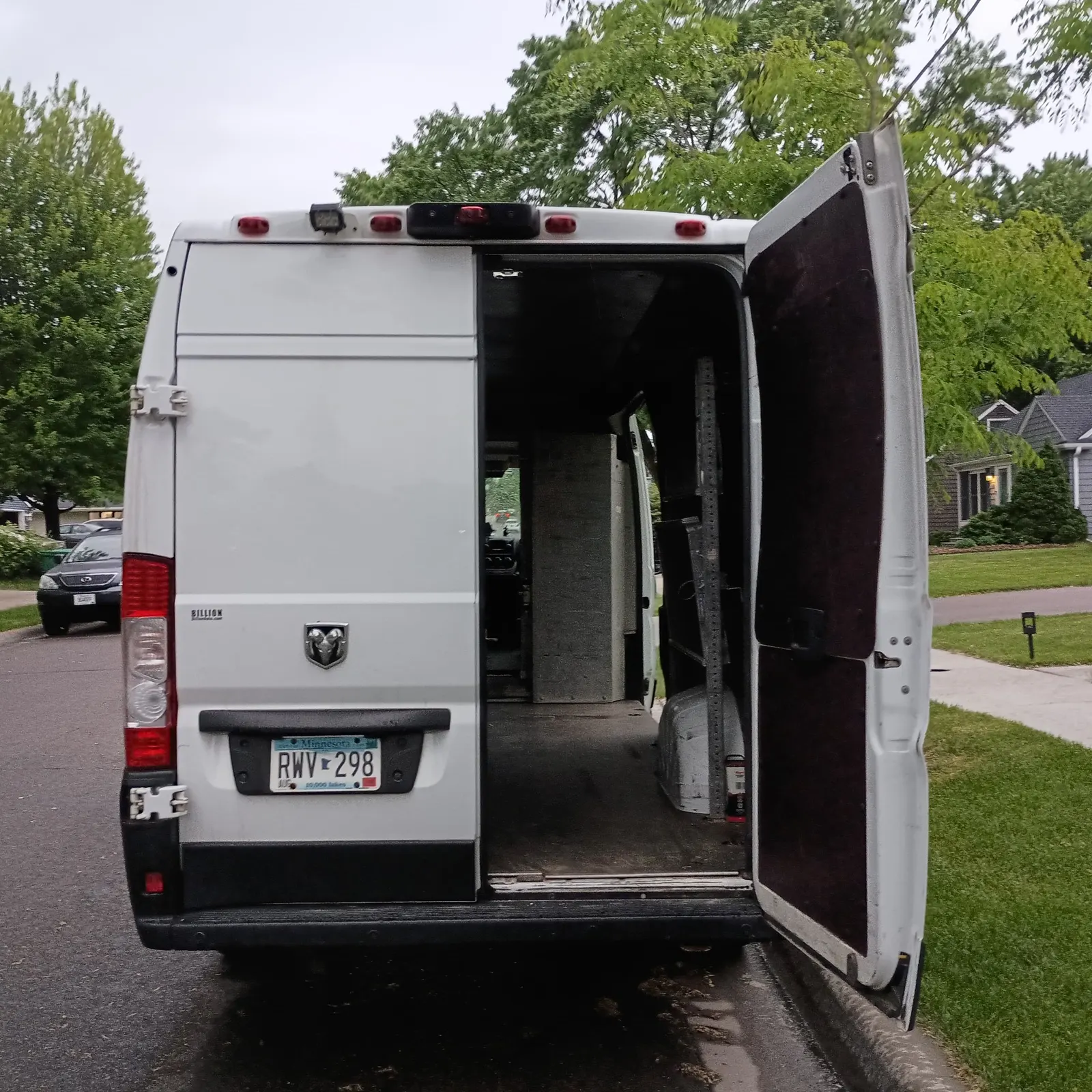 Open rear doors of cargo van — access to 144-inch long cargo area