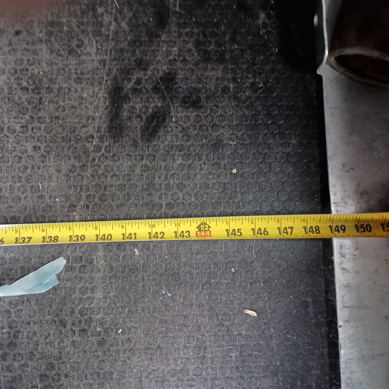 Tape measure reading 144 inches along the cargo floor length