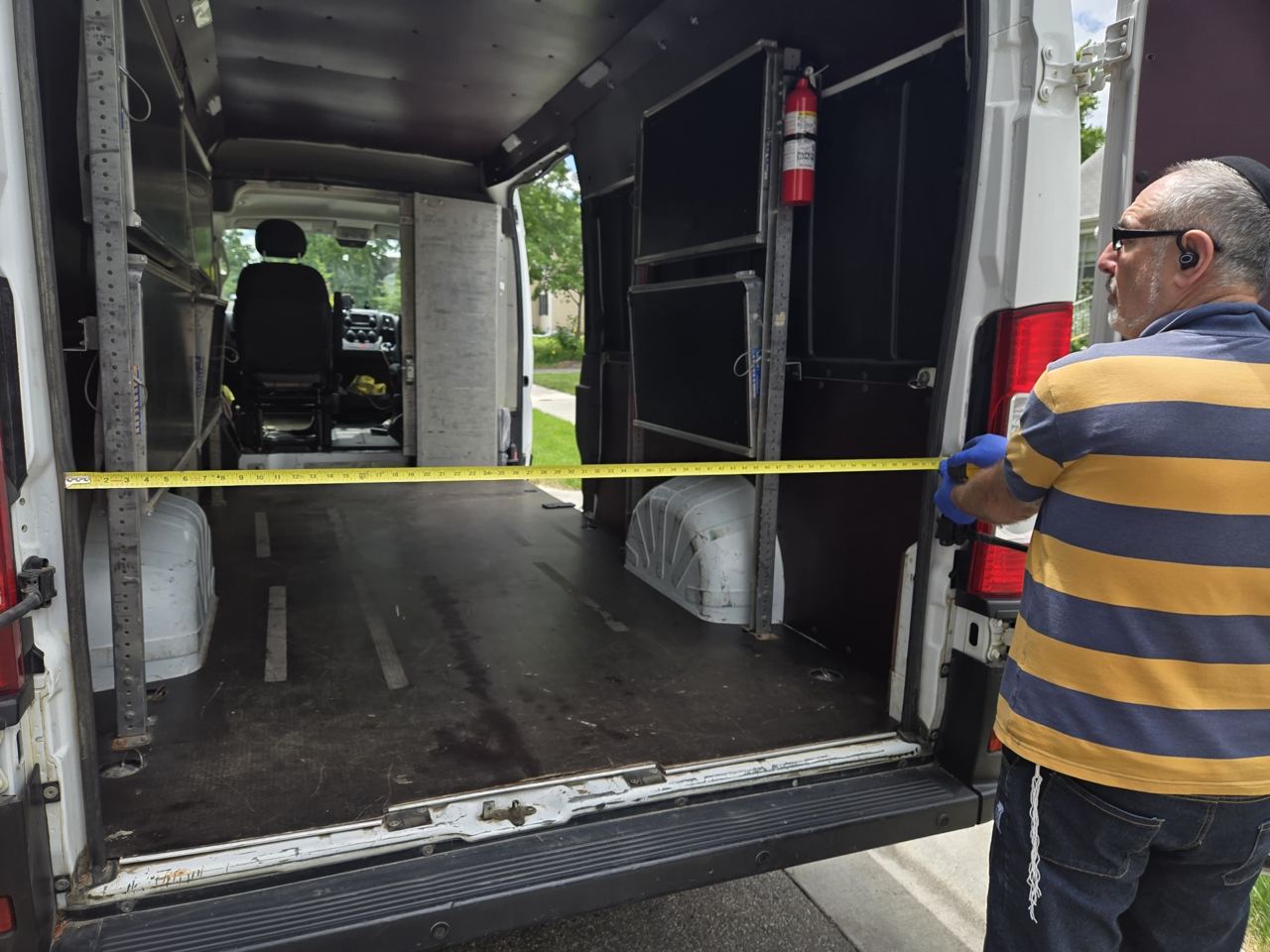 Tape measure across the maximum interior width of the cargo area